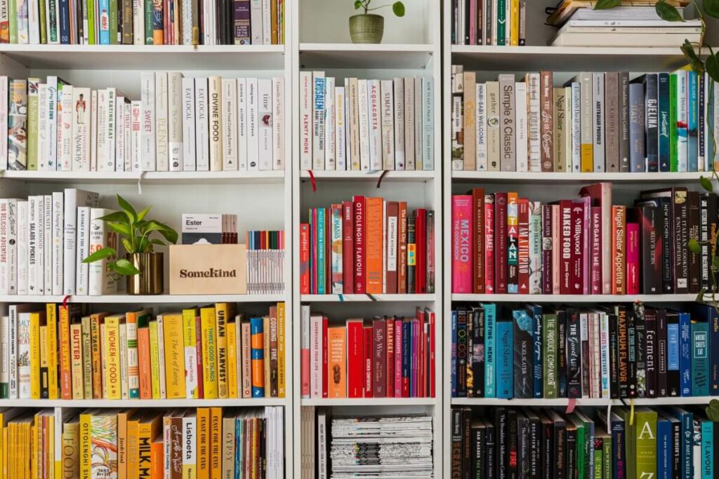 Bookshelf featuring books of many colours